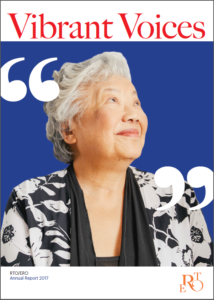 Cover of 2017 Annual report – photo of a smiling mature woman wearing a black and white shirt